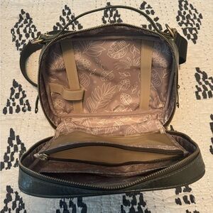 Twelve little diaper clutch in the Olive color